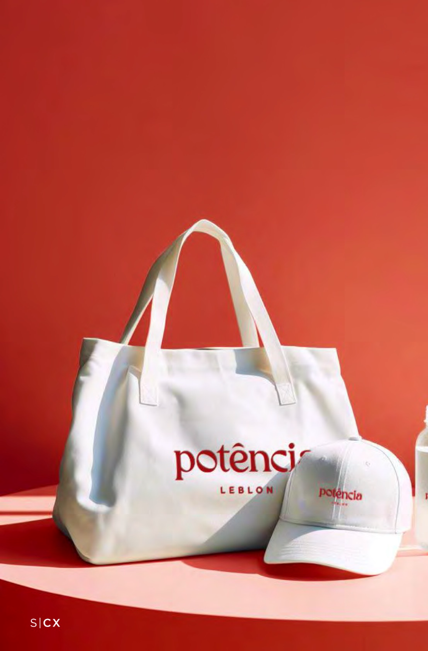 Off-white tote, cap and bottle against a red backdrop